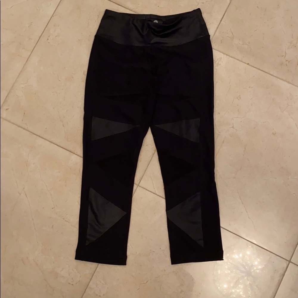 black cropped workout leggings with mesh triangles